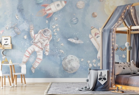 Tapeta kosmos z astronautą i rakietą w pokoju dziecięcym