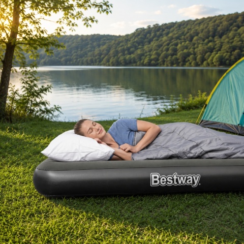 Jednoosobowy materac dmuchany na camping nad jeziorem zapewniający komfortowy wypoczynek na łonie natury