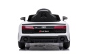 Tył białego Audi R8 na akumulator dla dziecka z charakterystycznymi lampami i sportowym zderzakiem.