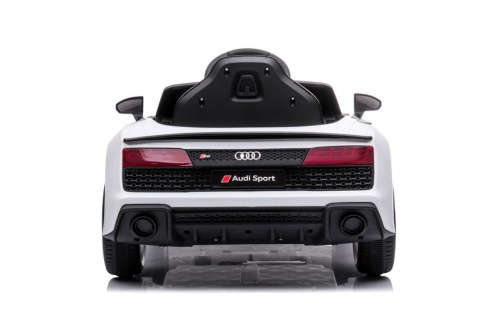 Tył białego Audi R8 na akumulator dla dziecka z charakterystycznymi lampami i sportowym zderzakiem.