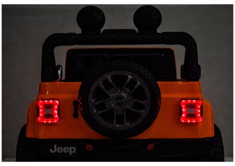 Tylne światła LED w pomarańczowym Jeep Rubicon dla dzieci