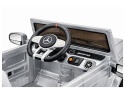 Kierownica i panel sterowania w Mercedesie AMG G63 na akumulator dla dzieci.