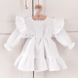 Biała muślinowa sukienka dla dziewczynki z falbankami i długim rękawem. Elegancka sukienka dziecięca handmade.