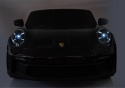 Przednie światła LED w sportowym aucie na akumulator Porsche GT3 dla dzieci