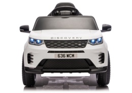 Biały Land Rover Discovery na akumulator dla dzieci – widok z przodu z oświetleniem LED