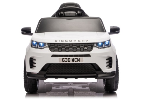 Biały Land Rover Discovery na akumulator dla dzieci – widok z przodu z oświetleniem LED