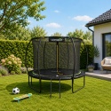 Trampolina ogrodowa 305 cm 10FT z siatką bezpieczeństwa i drabinką w przydomowym ogrodzie