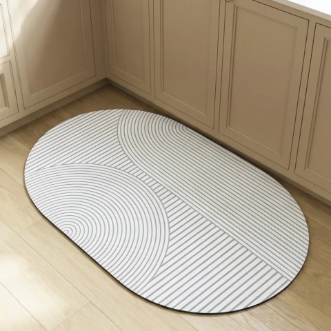 Dywanik uniwersalny dekoracyjny CLUSE 50x80 cm w kuchni z geometrycznym wzorem.