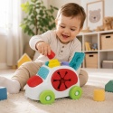 Autko sensoryczne Clementoni Clemmy z miękkimi klockami, sorterem i otwieraną klapą dla dzieci